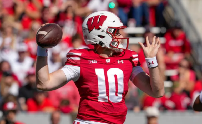Injury Blow: “Tyler Van Dyke’s Day Cut Short: Wisconsin QB Carted Off Field with Apparent Knee Injury Against Alabama